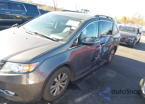 2014 Honda Odyssey Ex-L z USA, uszkodzony, nr VIN 5FNRL5H60EB031424